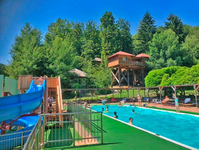 Image of Tree-Hotel pool area with Waterslide
